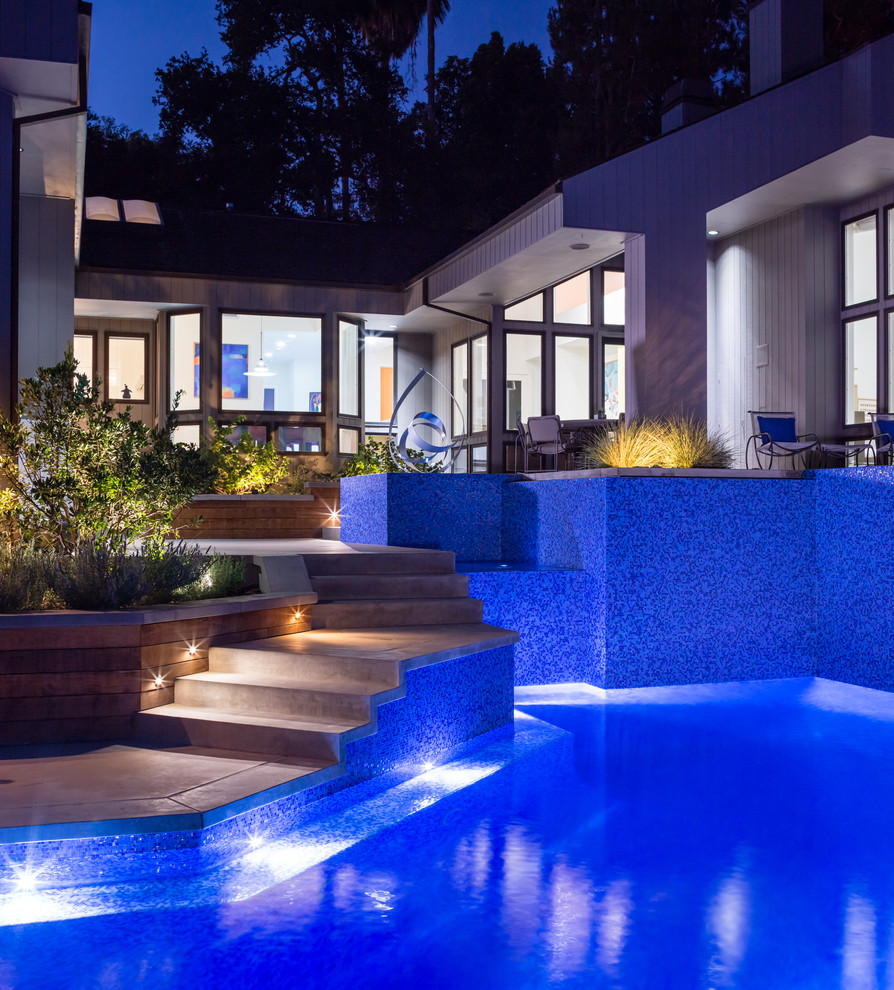 Iridescent Glass Tile Pool & Spa at Night Modern Pool Los Angeles