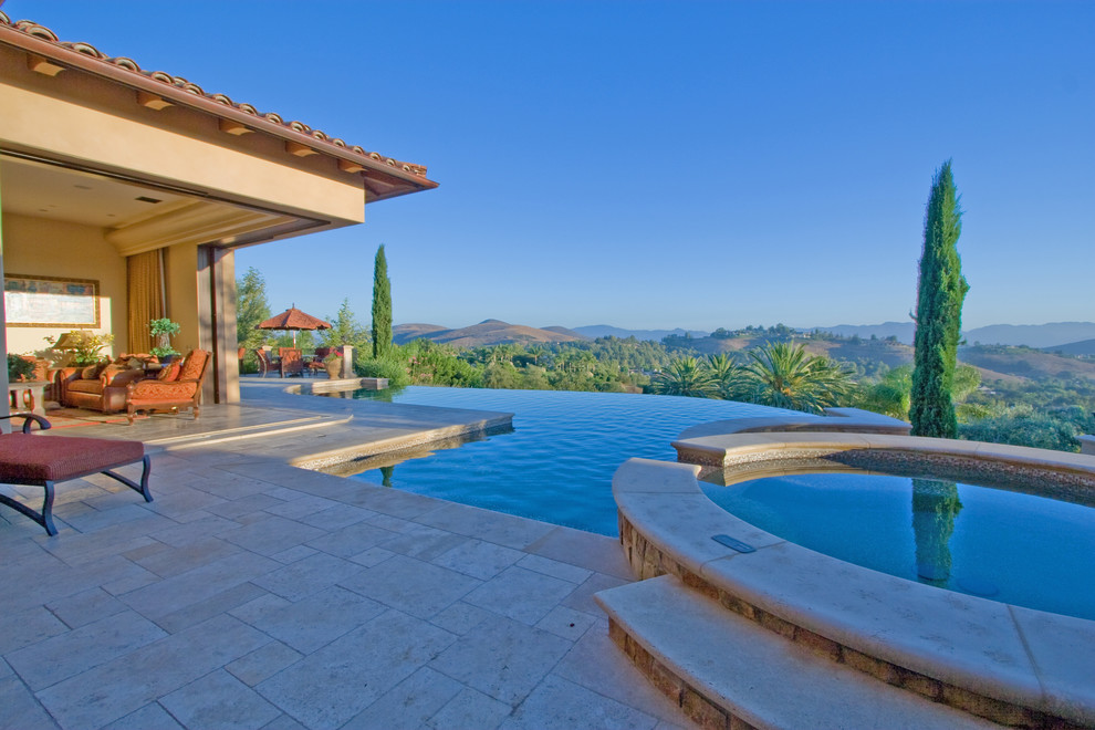 Design ideas for a mediterranean infinity swimming pool in Los Angeles.