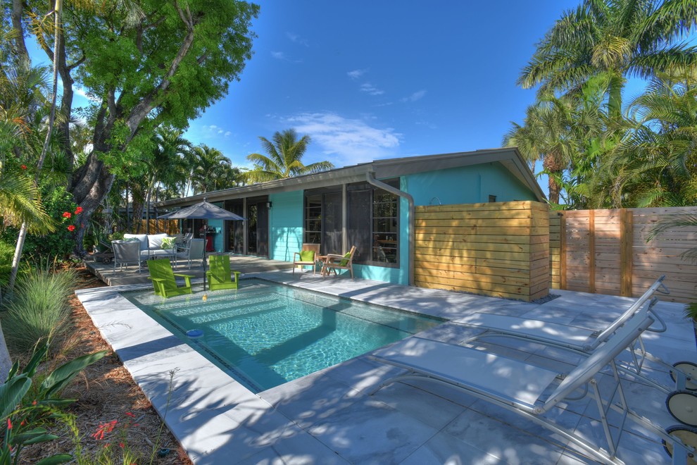 Inspiration for a 1960s pool remodel in Miami