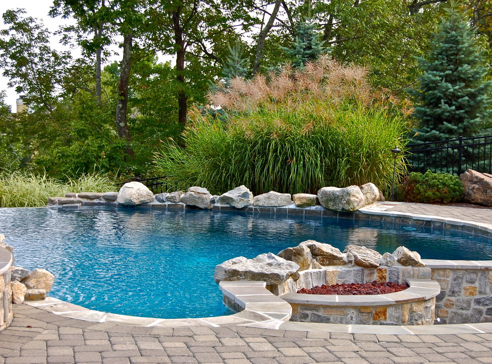 Example of an eclectic pool design in New York