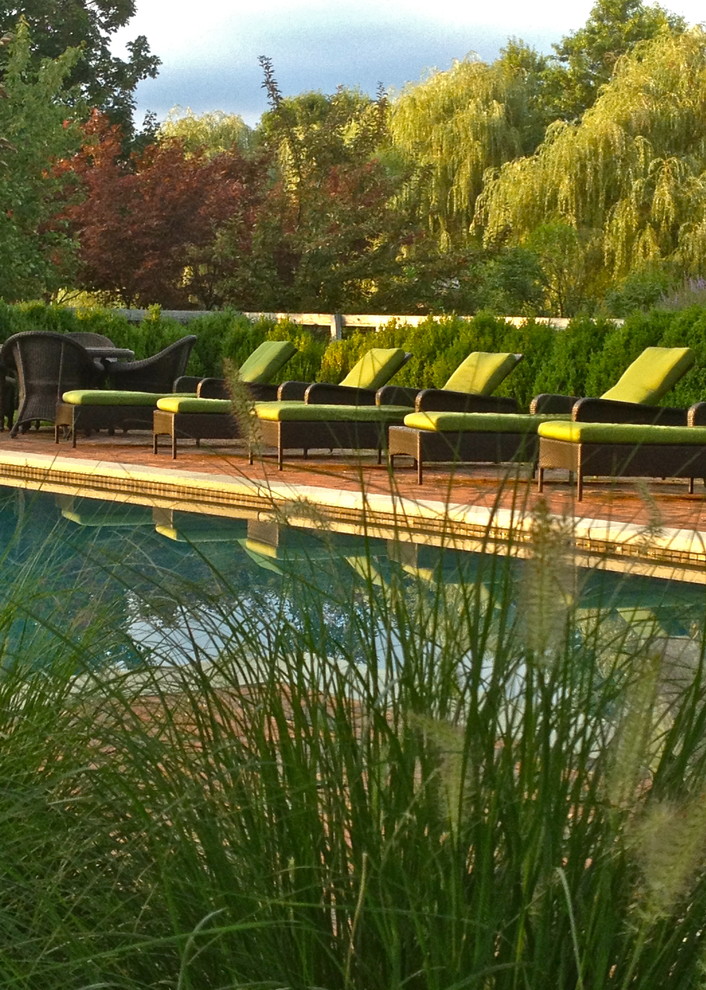 Example of an eclectic pool design in New York
