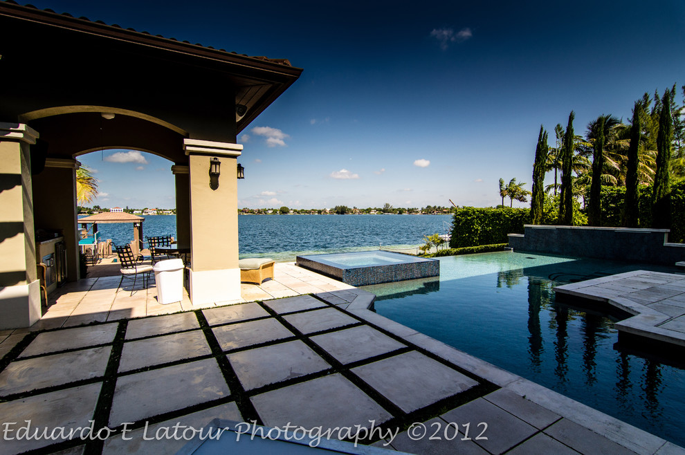 Tuscan pool photo in Miami