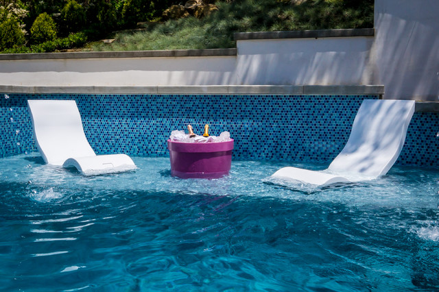 chair that sits in pool