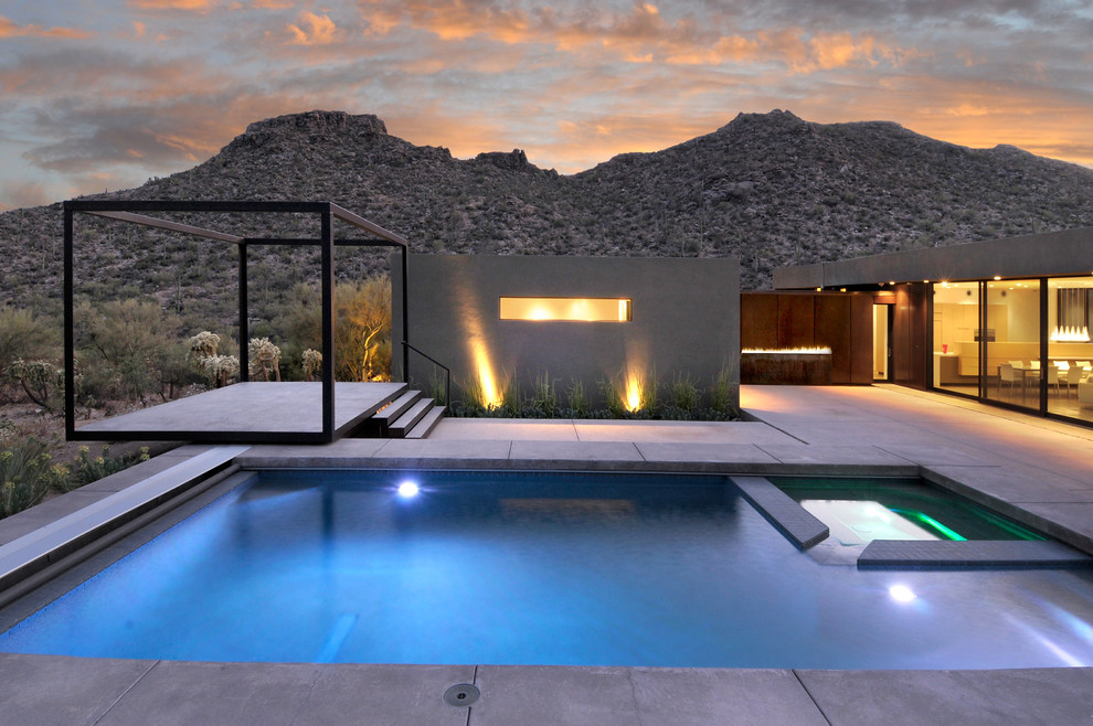 Inspiration for a modern rectangular swimming pool in Phoenix with a bbq area.