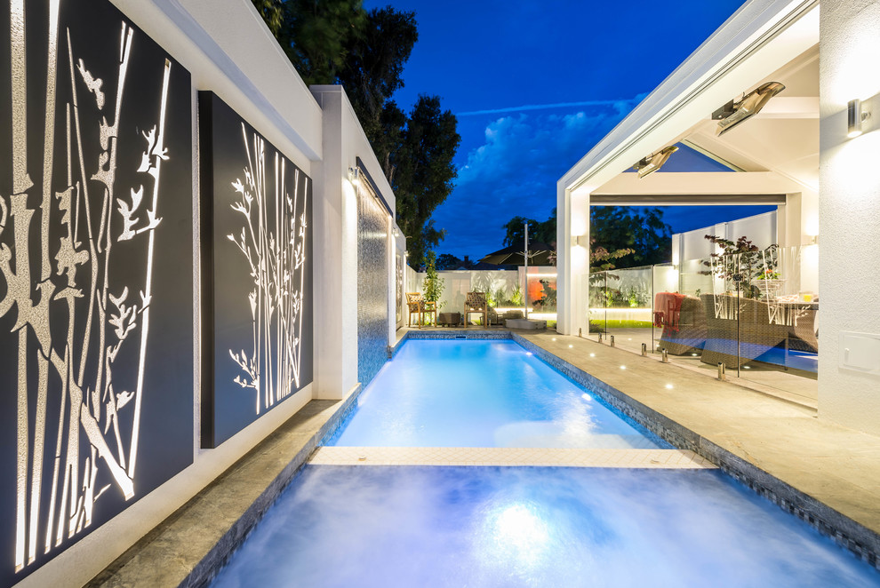 Inspiration for a mid-sized contemporary backyard pool remodel in Adelaide