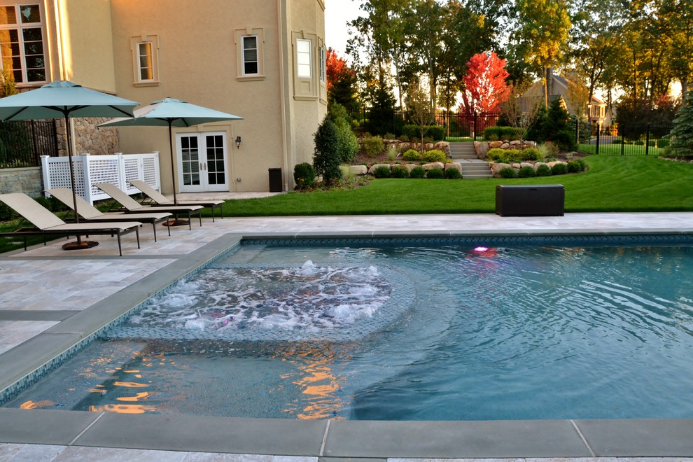 Inspiration for a huge contemporary backyard concrete paver and rectangular lap hot tub remodel in New York