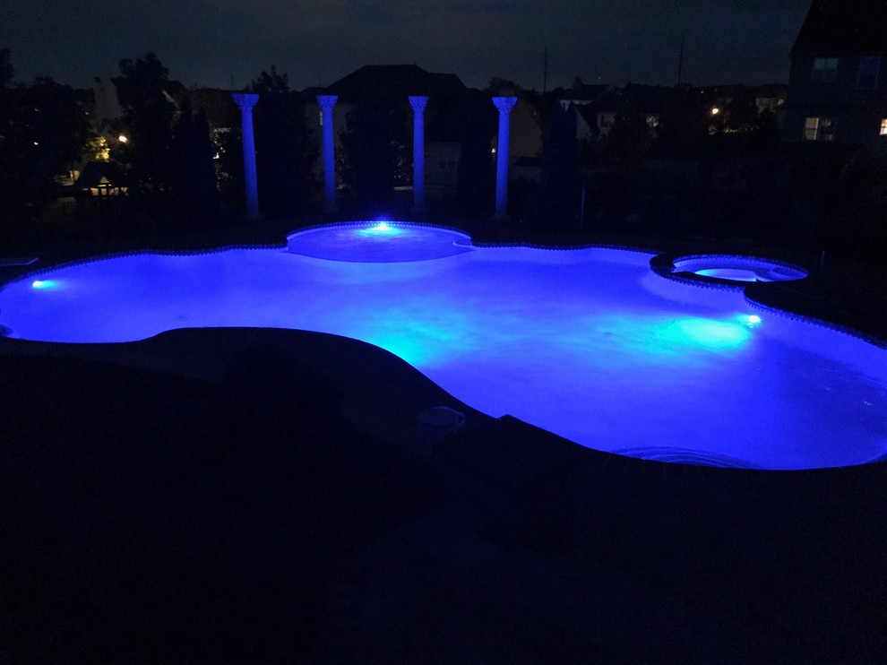 Lower Macungie large custom pool with spa, sunshelf, deck jets, and ...