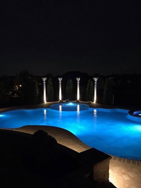 Lower Macungie large custom pool with spa, sunshelf, deck jets, and fountains Traditional