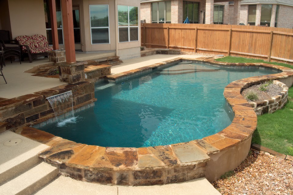 Design ideas for a classic swimming pool in Austin.