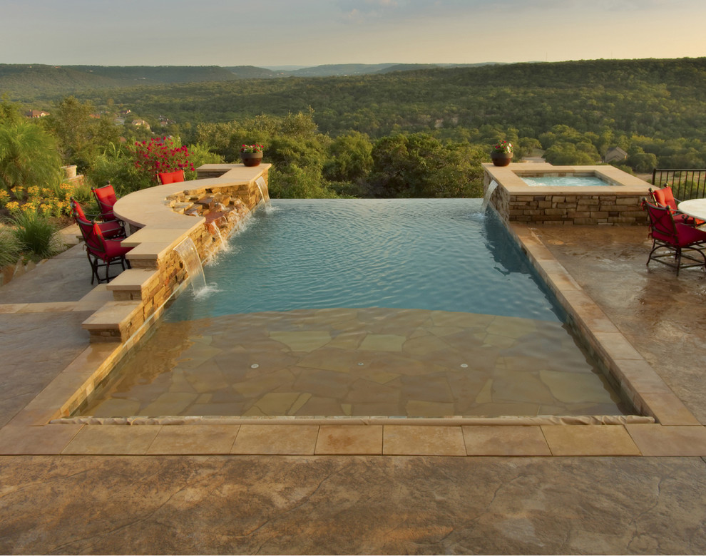 Inspiration for a timeless infinity pool remodel in Austin