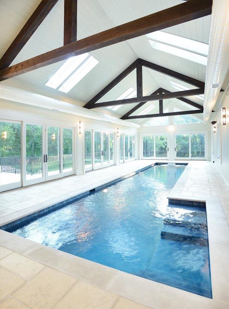 Example of a mid-sized transitional indoor rectangular pool design in Nashville