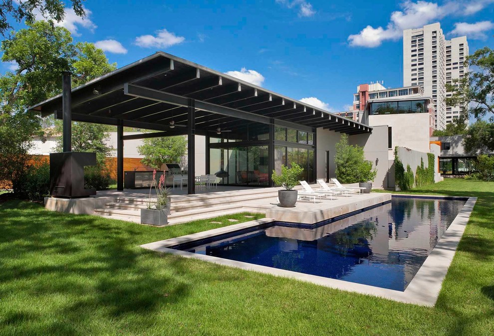Mid-sized minimalist custom-shaped pool photo in Houston