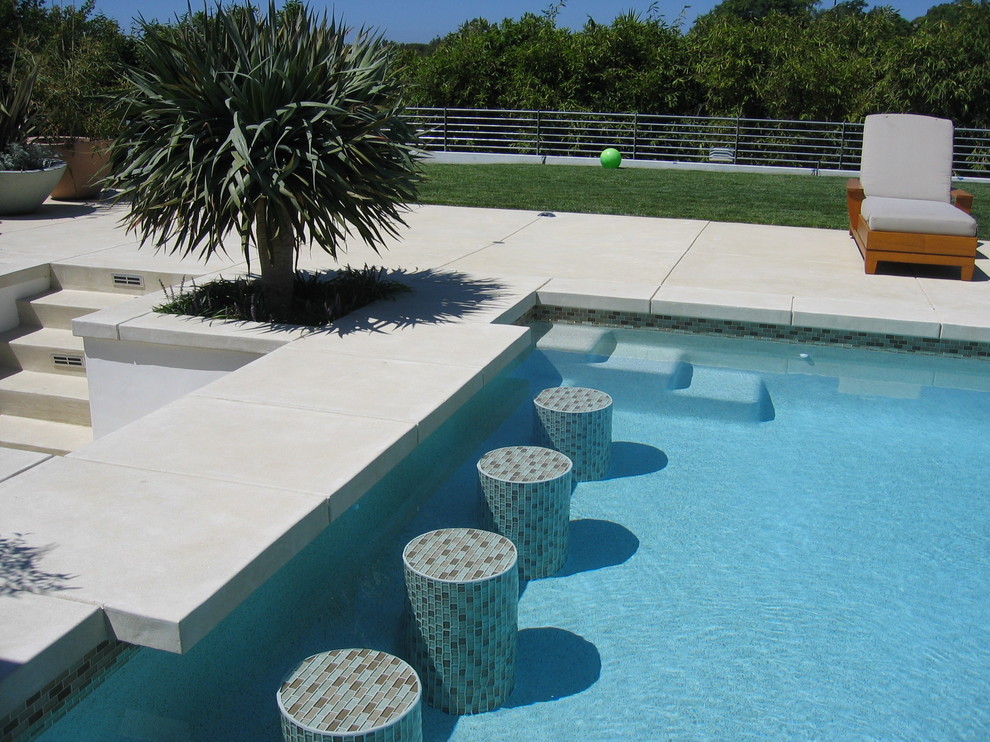 Inspiration for a contemporary concrete pool remodel in Las Vegas