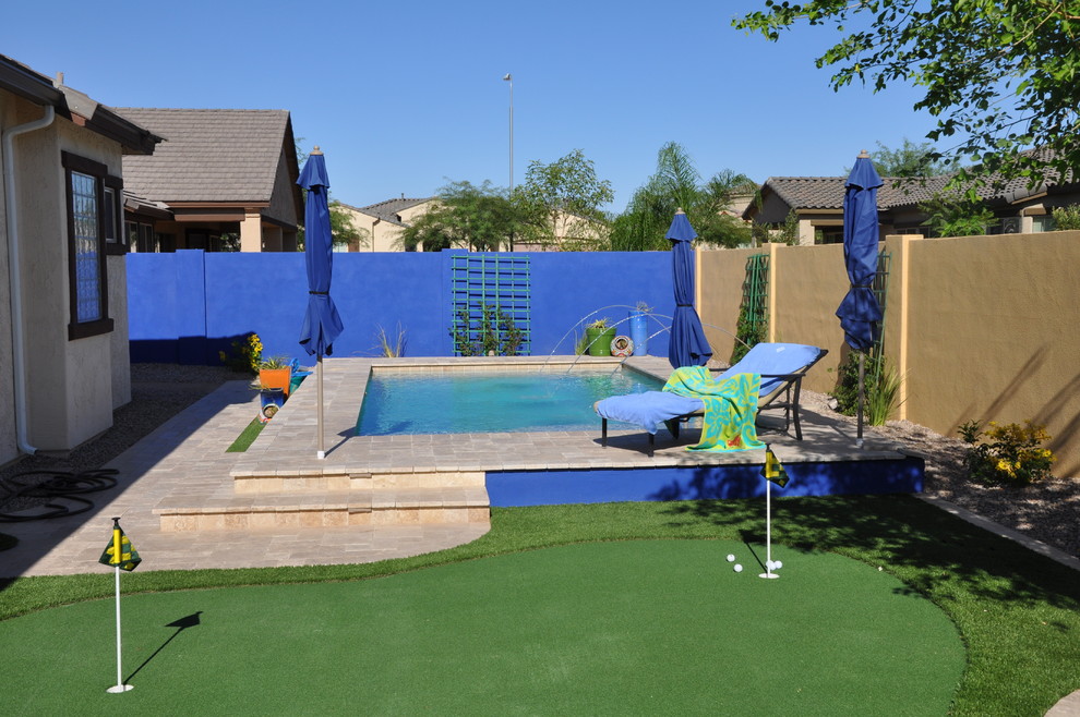 Eclectic pool photo in Phoenix