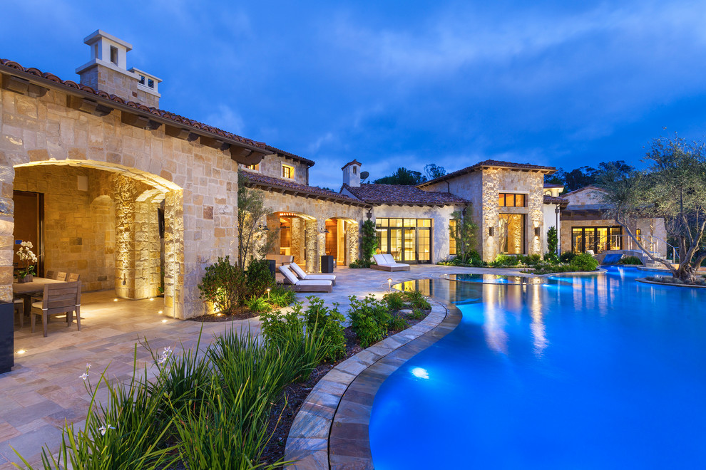 Example of a tuscan custom-shaped pool design in San Diego