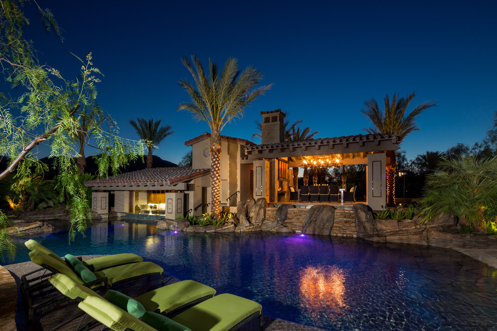 Inspiration for a mediterranean custom-shaped pool remodel in Orange County