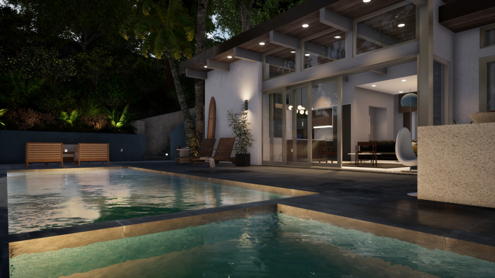 Imagen de piscinas y jacuzzis alargados vintage de tamaño medio rectangulares en patio trasero con suelo de baldosas