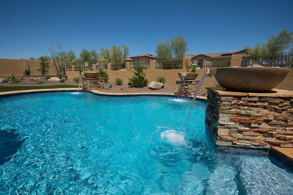Photo of a mediterranean swimming pool in Phoenix.