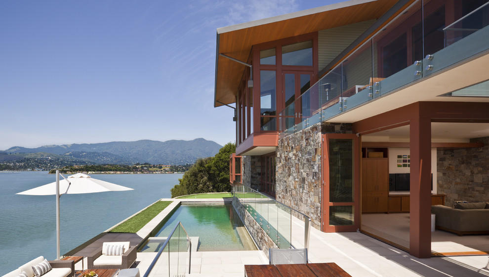 This is an example of a contemporary back swimming pool in San Francisco.