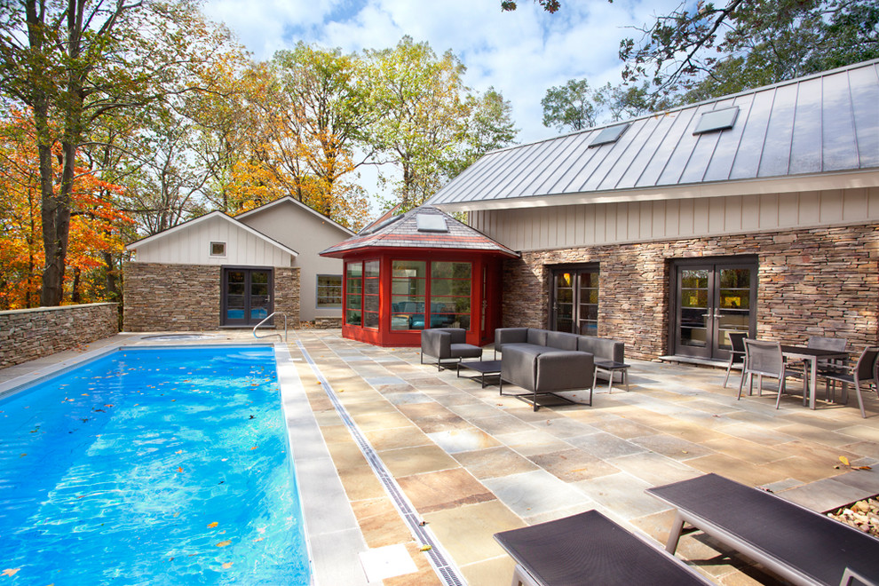 Example of a large trendy rectangular pool design in Charleston