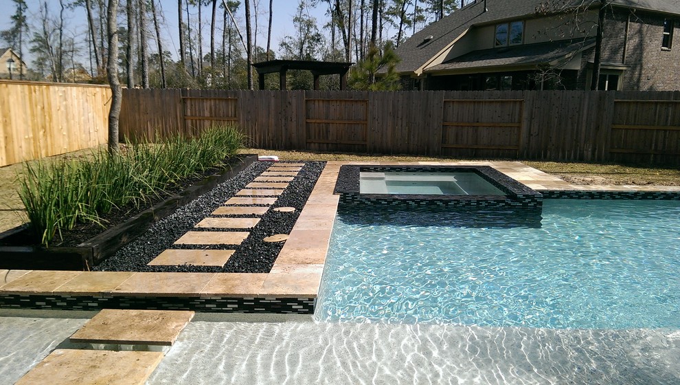 Inspiration for a contemporary pool remodel in Houston