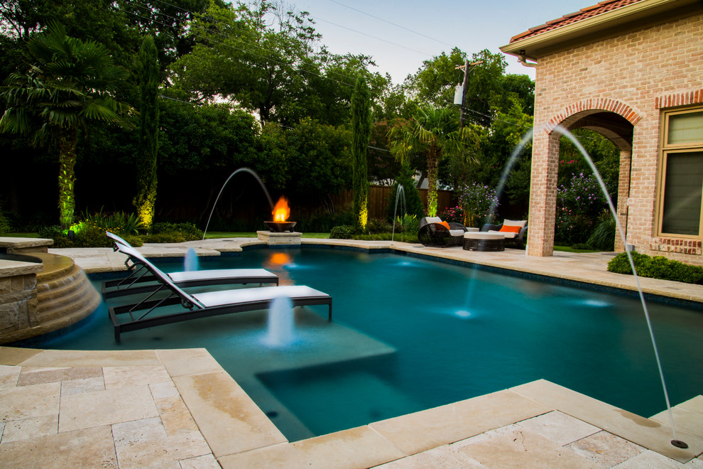 This is an example of a mediterranean swimming pool in Dallas.