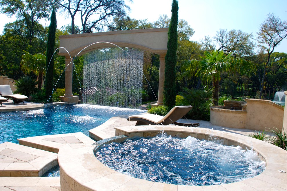 Design ideas for a mediterranean custom shaped swimming pool in Dallas.