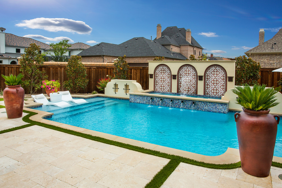 Photo of a medium sized mediterranean back rectangular lengths swimming pool in Dallas with tiled flooring.