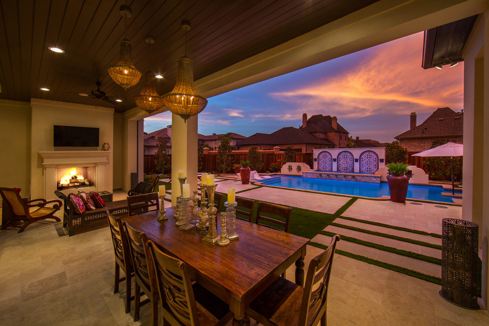 Mid-sized tuscan backyard tile and rectangular lap pool photo in Dallas