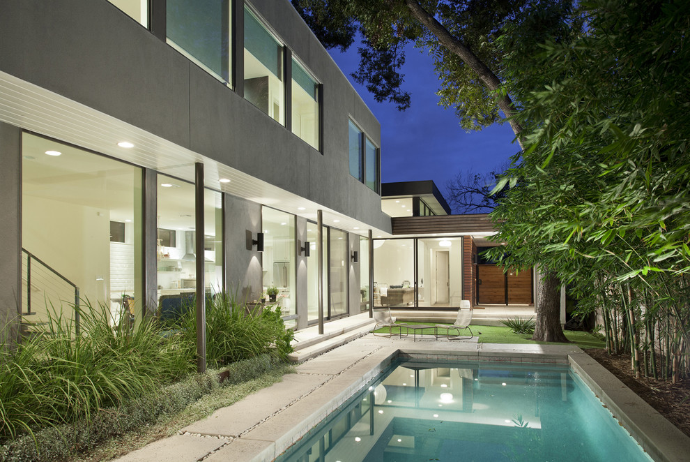 Minimalist rectangular pool photo in Austin