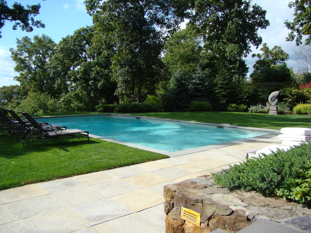 This is an example of a traditional rectangular swimming pool in New York.