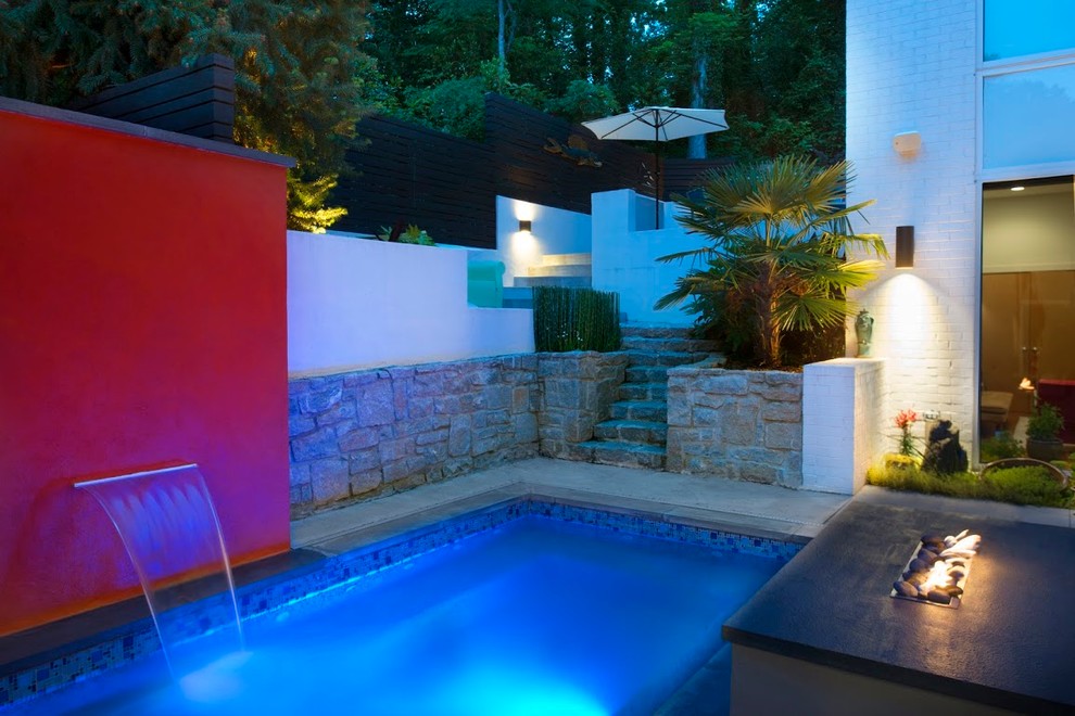 Inspiration for a small modern courtyard rectangular hot tub remodel in Atlanta