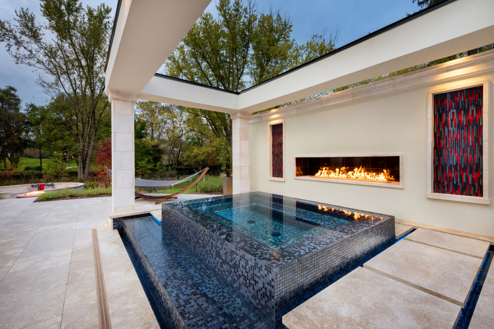 Hot tub - mid-sized contemporary backyard stone and rectangular hot tub idea in Tampa