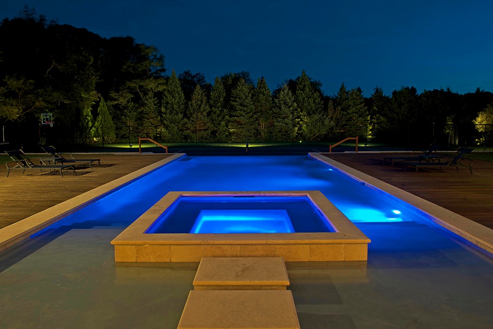 Design ideas for a contemporary infinity swimming pool in New York.