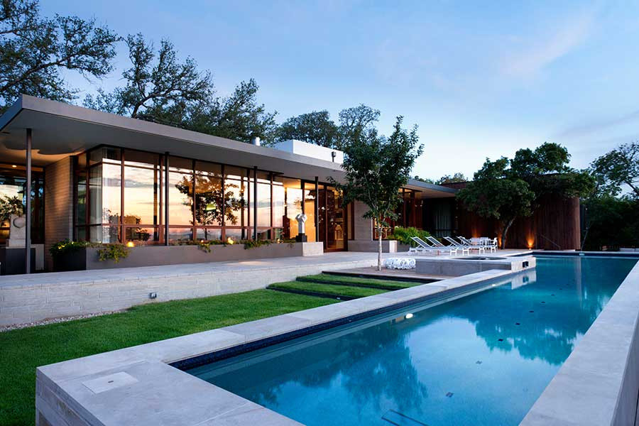 Inspiration for a mid-sized contemporary backyard rectangular lap pool remodel in Austin