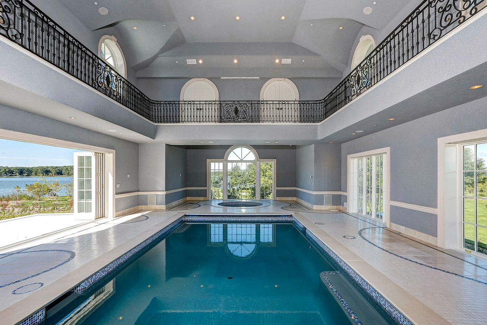 Photo of an expansive traditional swimming pool in Baltimore.