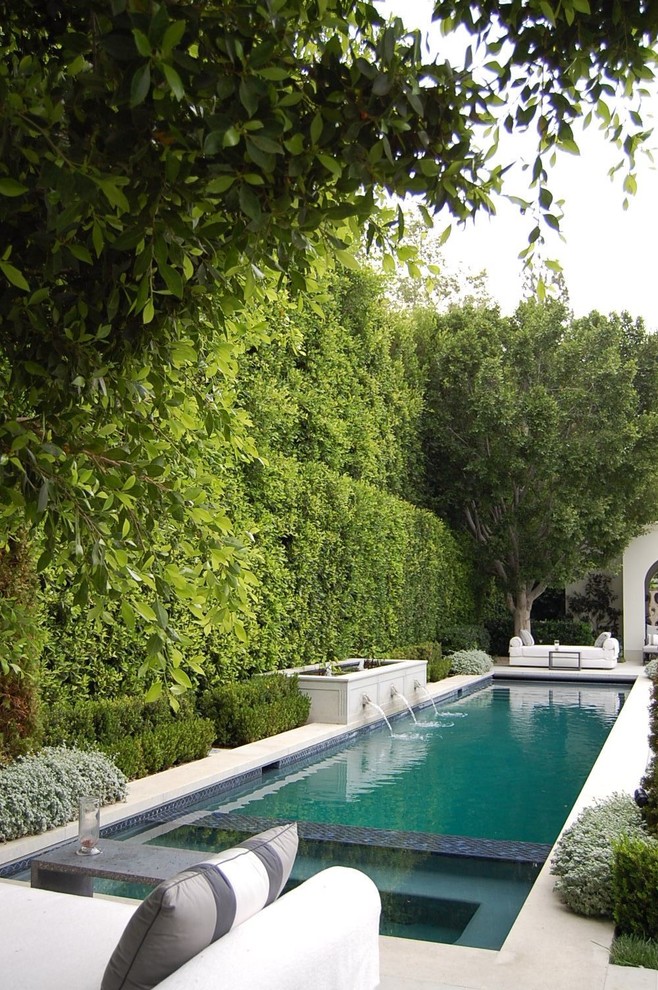 Design ideas for a traditional rectangular lengths swimming pool in Los Angeles.