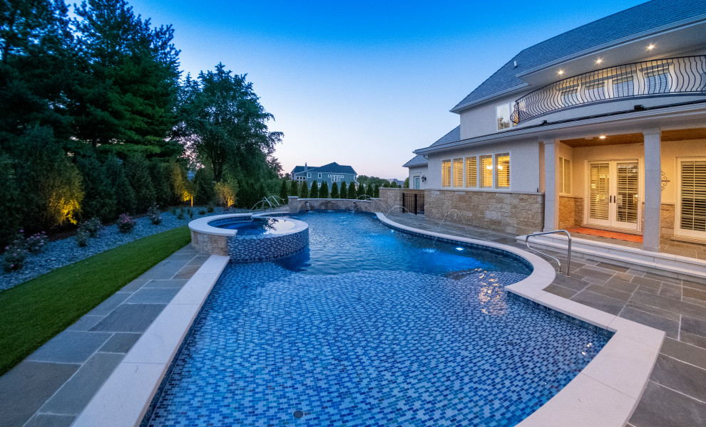 Inspiration for a mid-sized modern backyard stone and custom-shaped natural pool landscaping remodel in Chicago