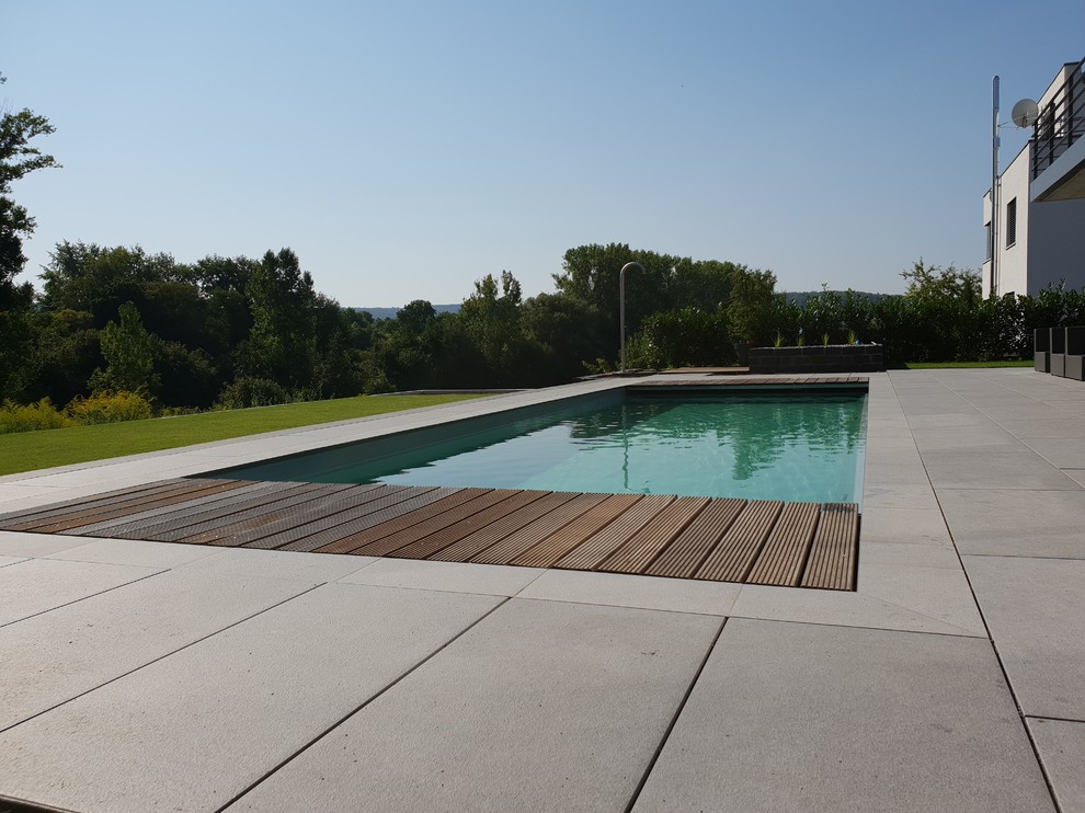 Foto de piscina minimalista grande rectangular