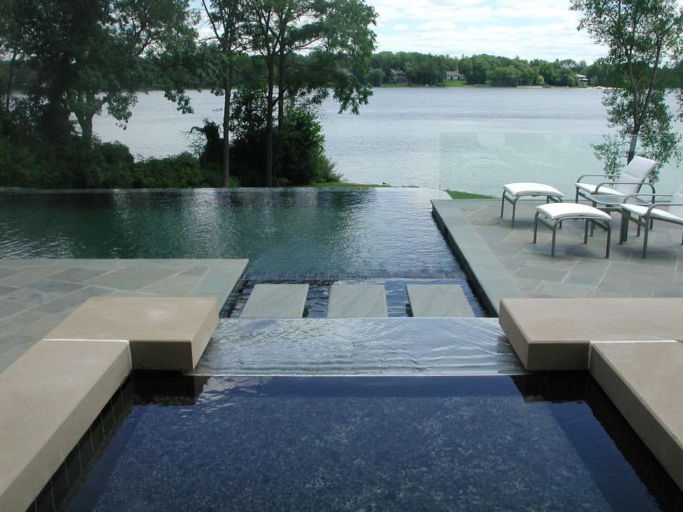 Example of a large minimalist aboveground pool design in Detroit