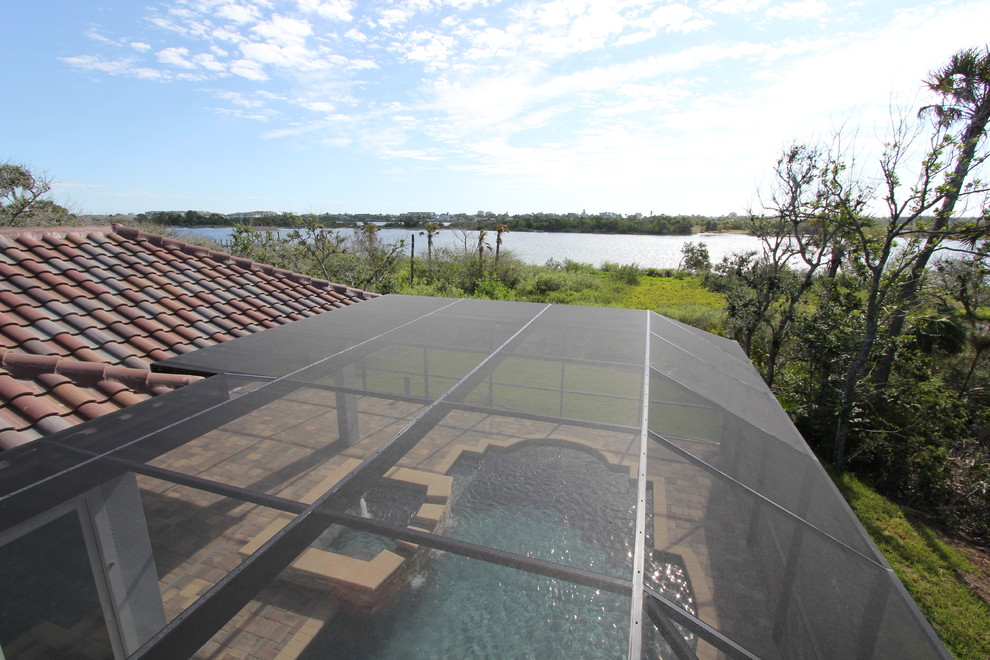 Großer Mediterraner Pool in individueller Form mit Betonboden in Orlando