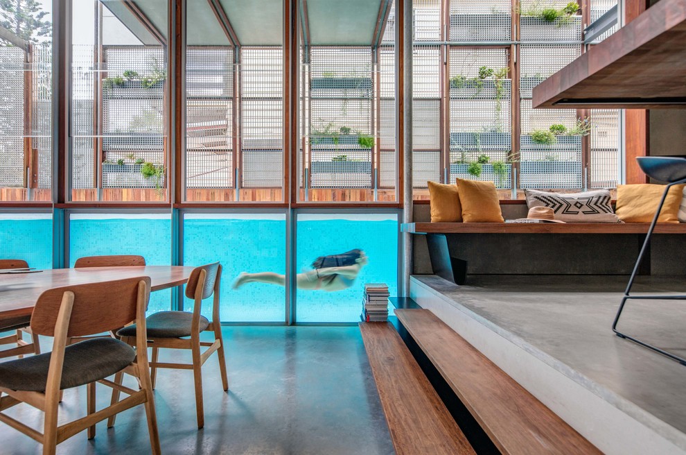 Medium sized contemporary rectangular above ground swimming pool in Sydney.