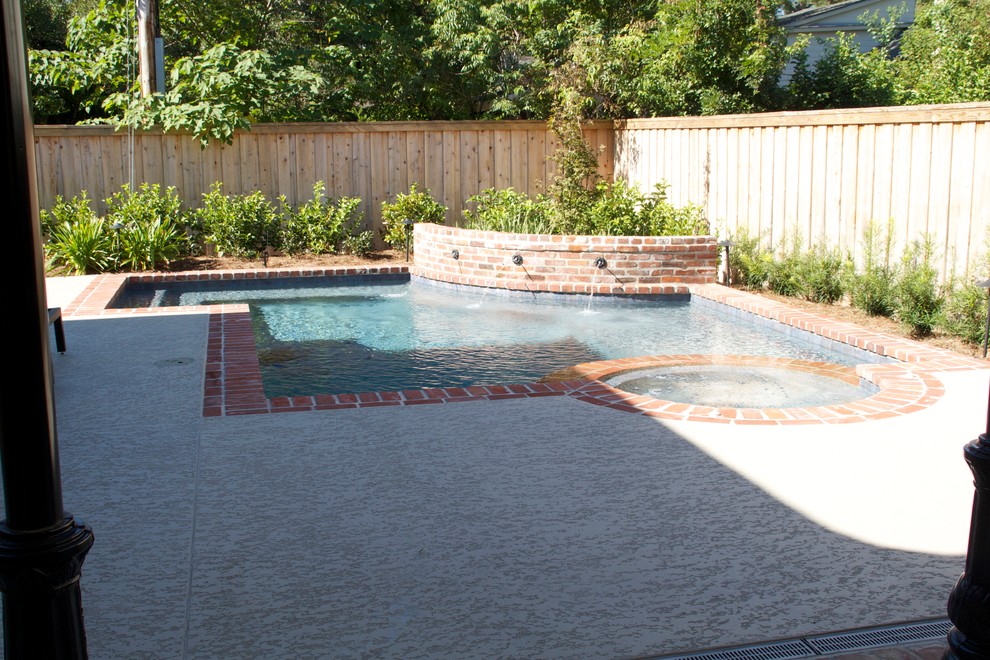 Design ideas for a medium sized traditional back custom shaped lengths hot tub in New Orleans with brick paving.