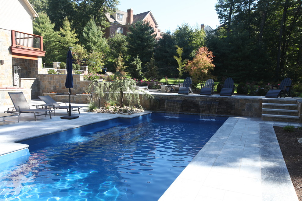 Pool - large transitional backyard rectangular lap pool idea in Bridgeport