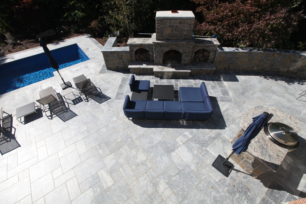 Large transitional backyard rectangular lap pool photo in Bridgeport