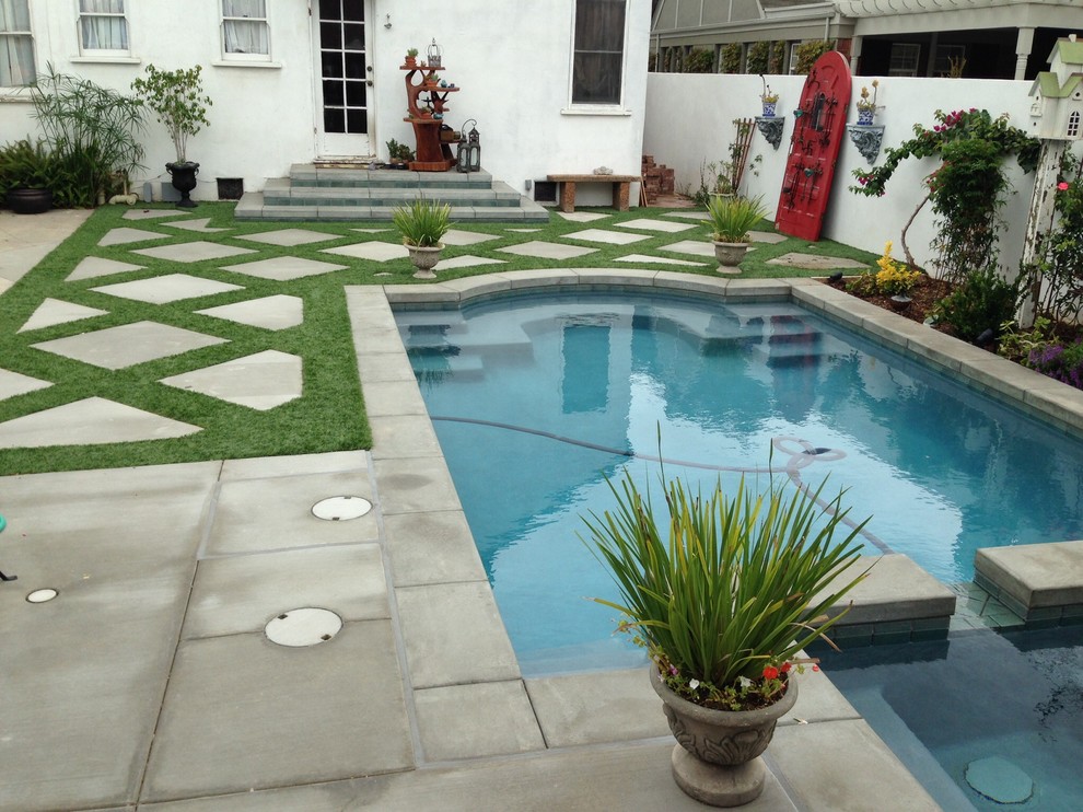 Inspiration for a rustic swimming pool in Orange County.