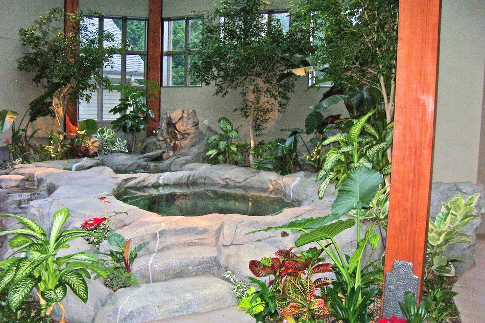 Small backyard natural hot tub photo in Seattle