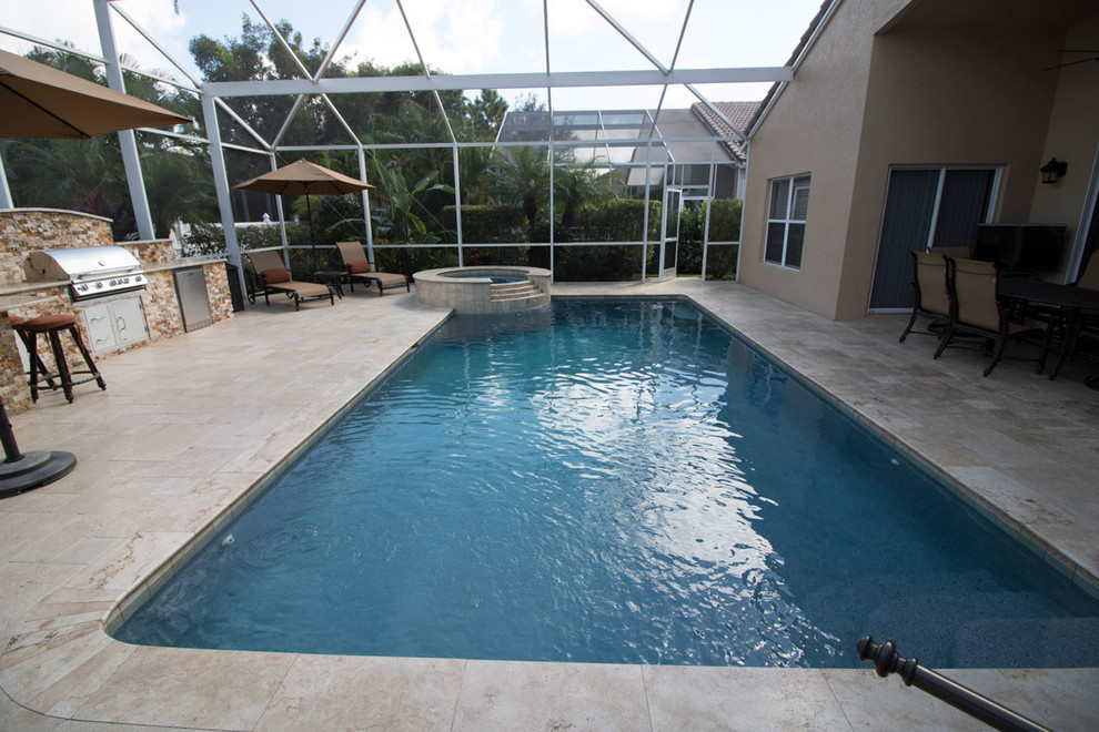 Ejemplo de piscinas y jacuzzis alargados contemporáneos grandes interiores y rectangulares con suelo de baldosas