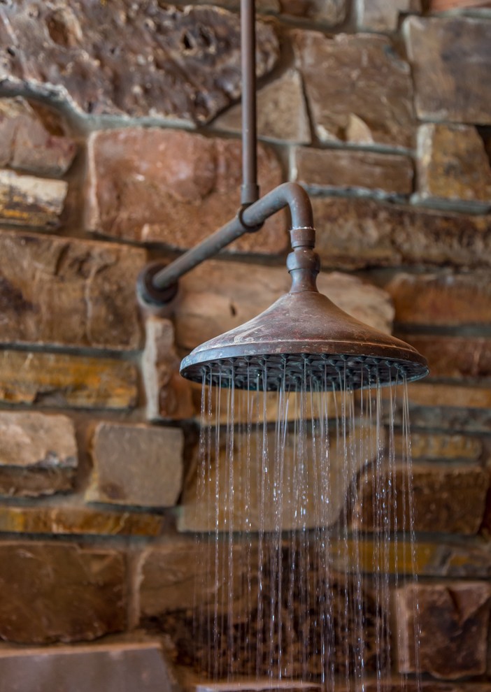 Outdoor heated shower adjoins hot tub and sauna area Rustic Pool