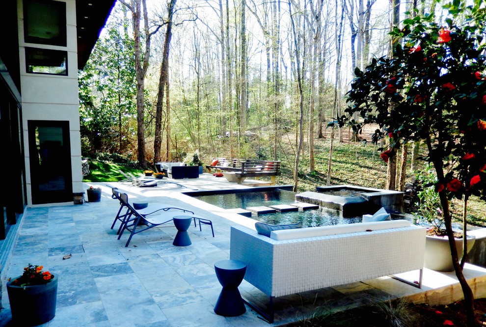 Design ideas for a contemporary swimming pool in Atlanta.